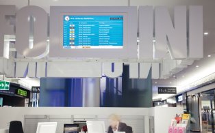 ZVV Corporate client monitor in the reception area of an office